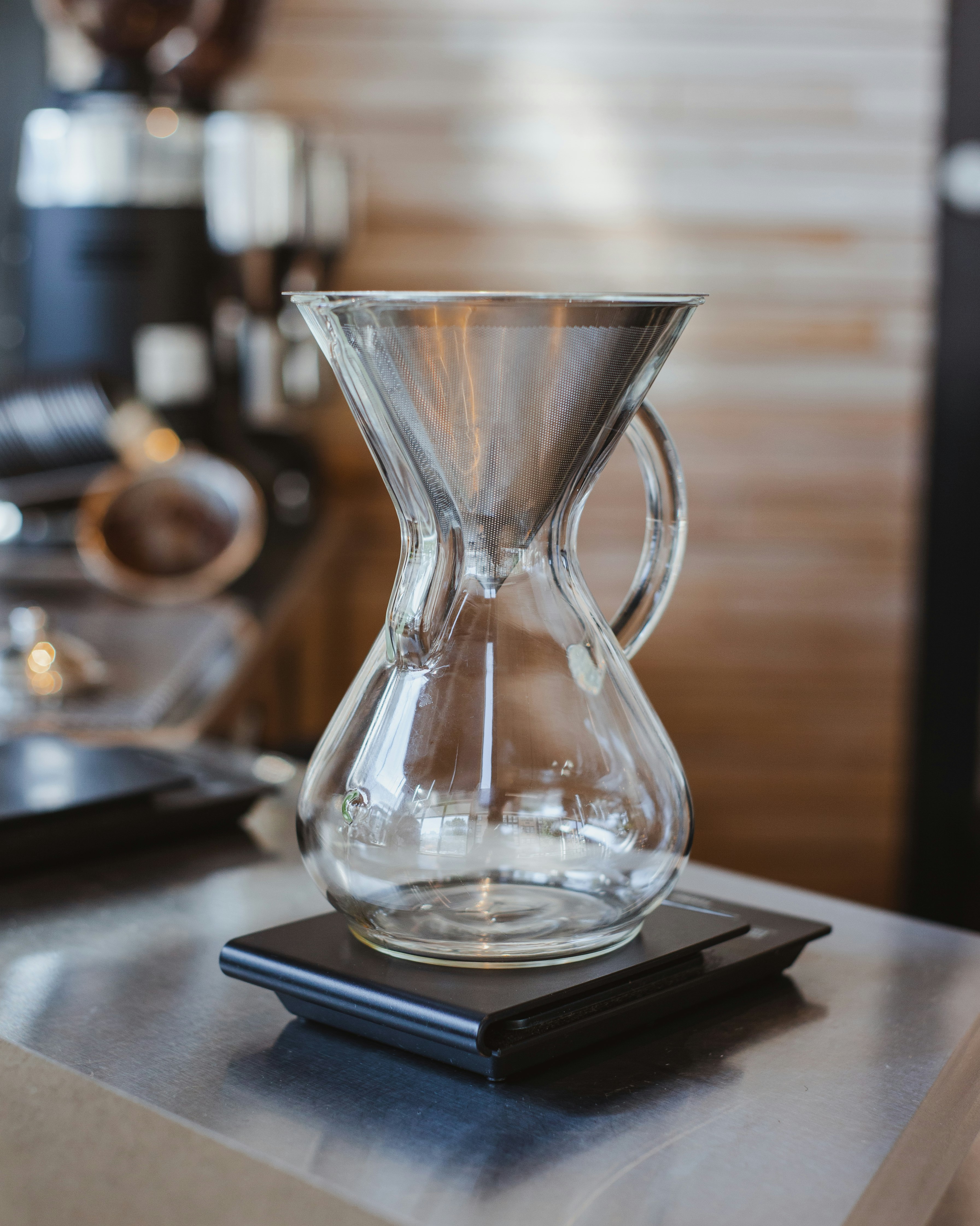 clear glass vase on black table